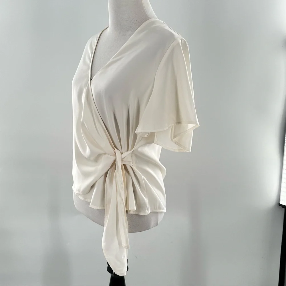 Express womens top size M cream wrap flutter sleeve career
